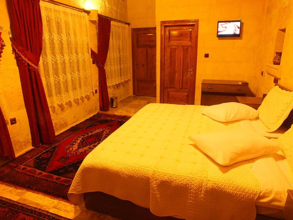 Dilek Tepesi Cave Hotel Ayvali Rom bilde