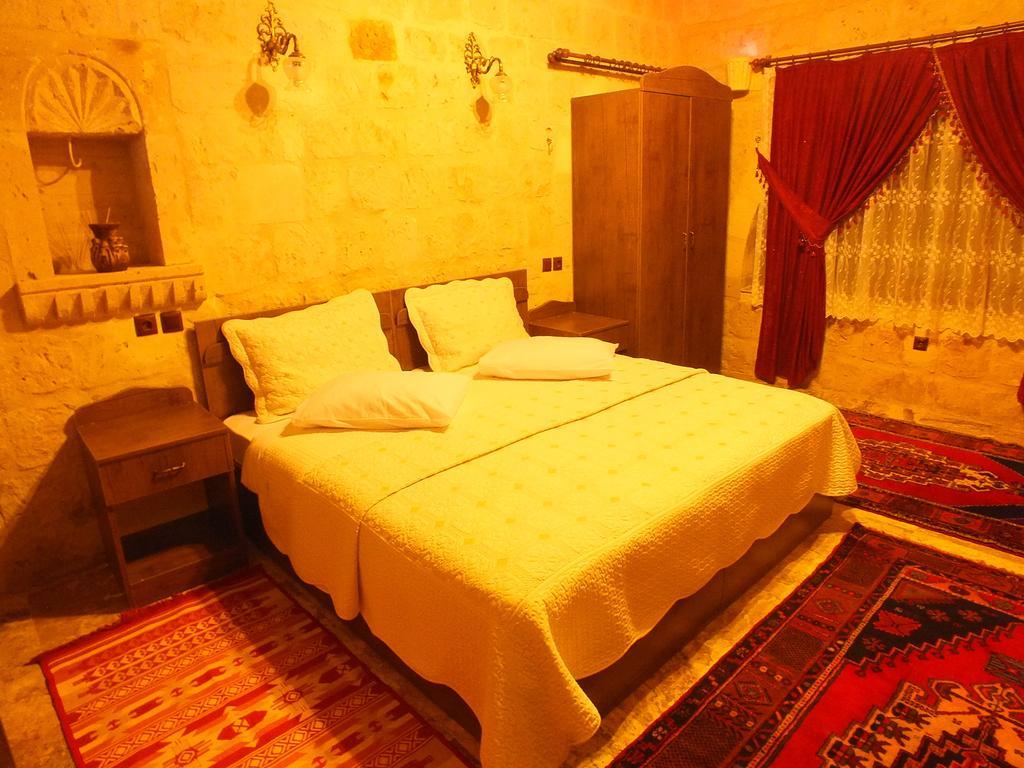 Dilek Tepesi Cave Hotel Ayvali Rom bilde